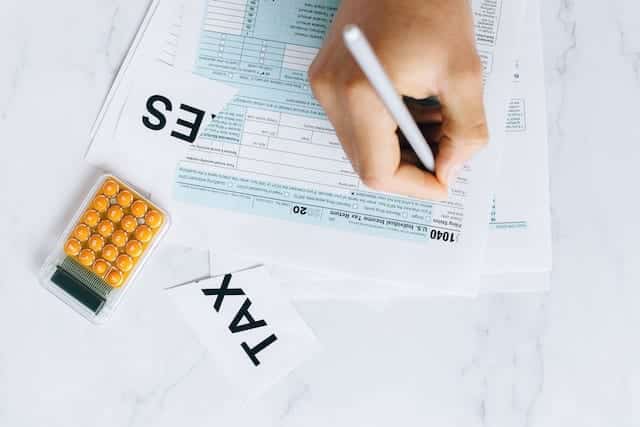 How is a Disability Income Benefit Received under a Life Insurance Policy Treated for Income Tax Purposes?
